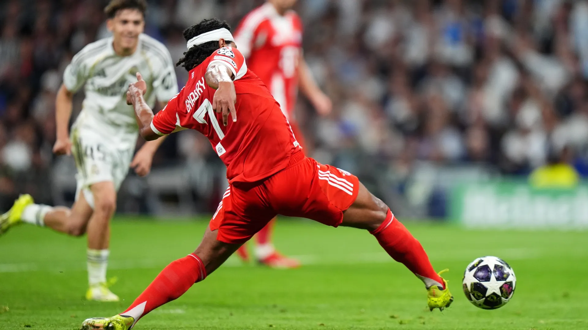 Serge Gnabry of FC Bayern Munich controls the ball during the UEFA Champions League.