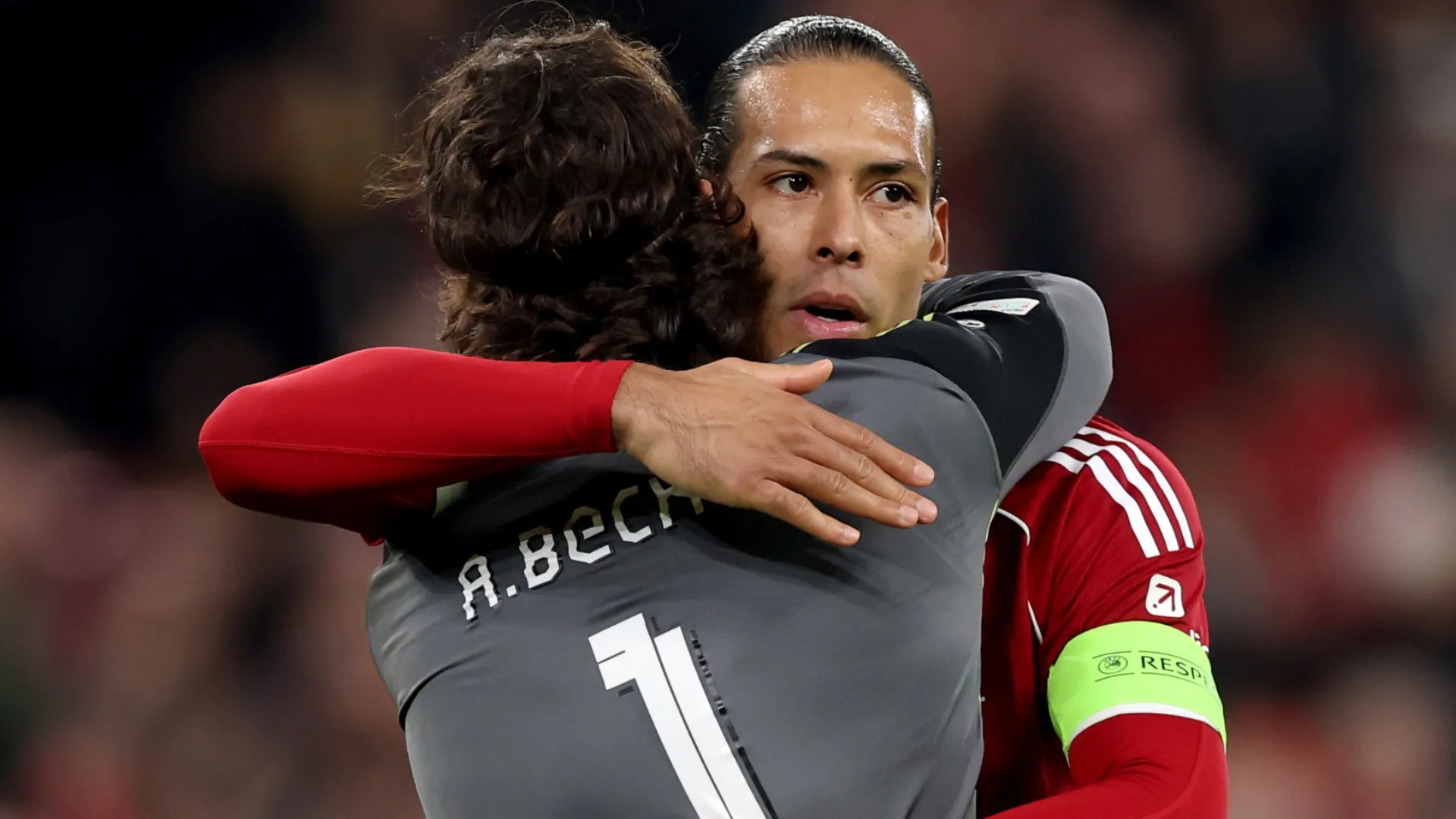 Virgil van Dijk of Liverpool and Alisson Becker of Liverpool celebratre.