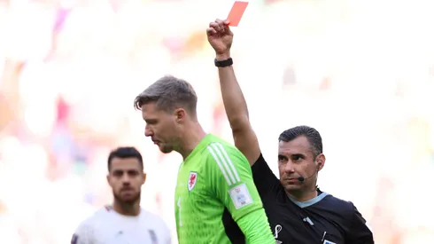 Wayne Hennessey of Wales is shown a red card by referee Mario Alberto Escobar Toca during the FIFA World Cup Qatar