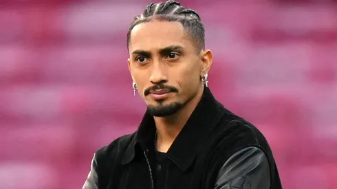 Raphinha of FC Barcelona inspects the pitch prior to the UEFA Champions League.
