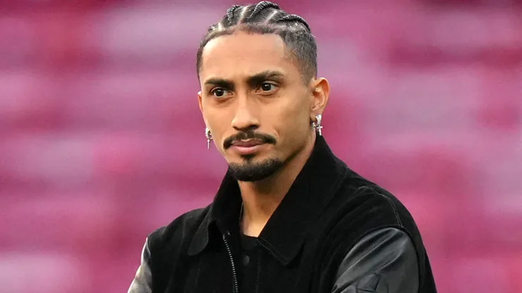 Raphinha of FC Barcelona inspects the pitch prior to the UEFA Champions League.