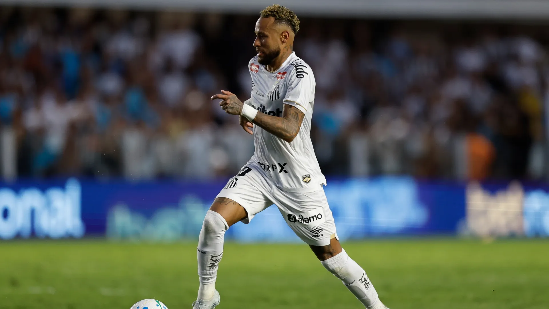 Neymar of Santos controls the ball.