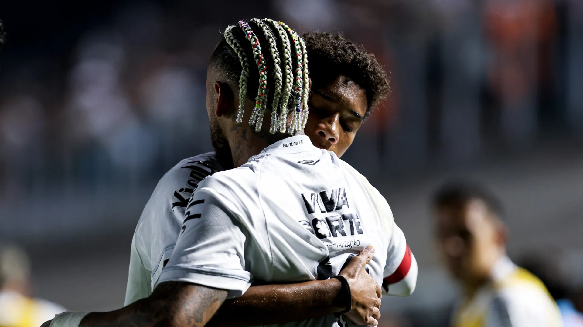 Neymar of Santos celebrates after scoring with Robinho Junior.