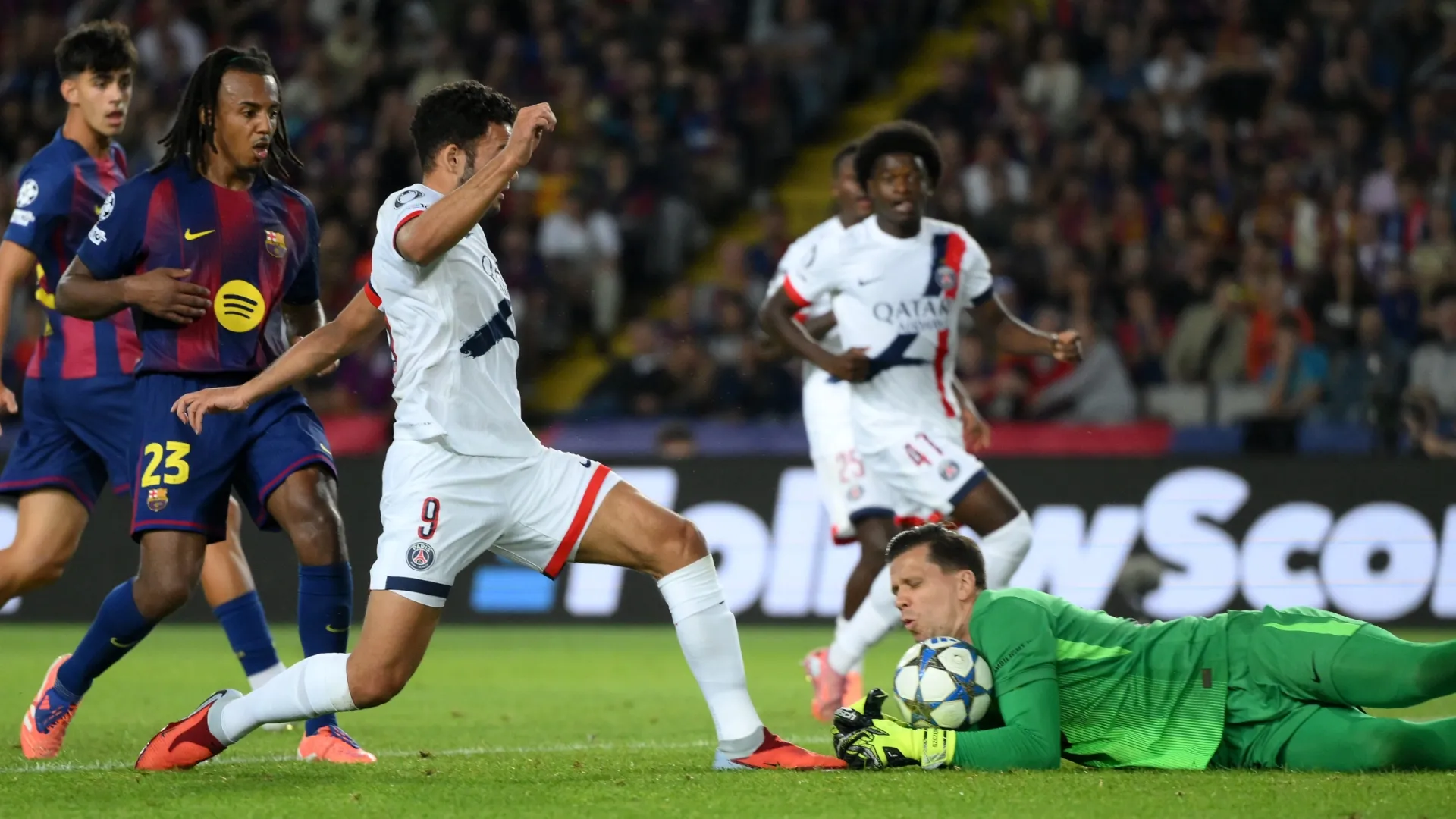 Wojciech Szczesny of FC Barcelona saves the shot of Goncalo Ramos of Paris Saint-Germain.