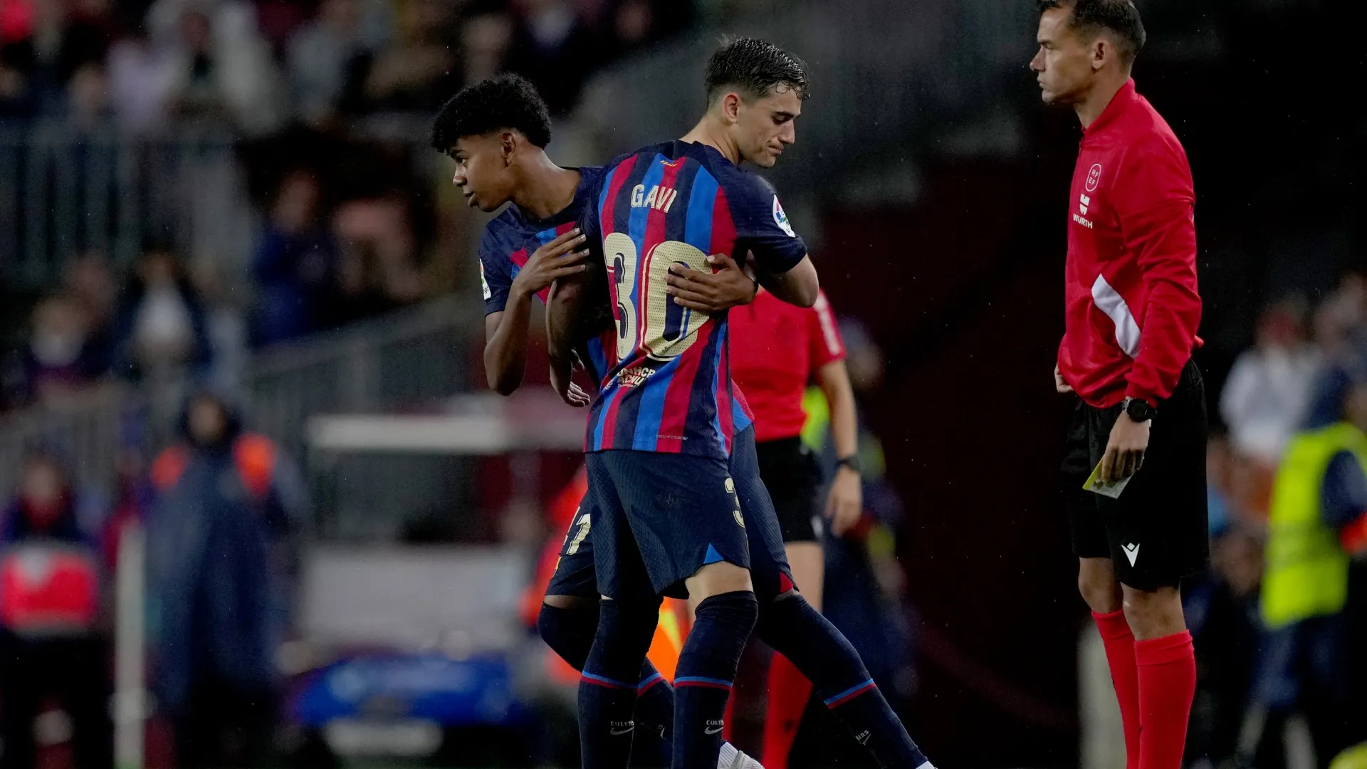 Gavi of FC Barcelona is substituted off for Lamine Yamal in the game against Real Betis.