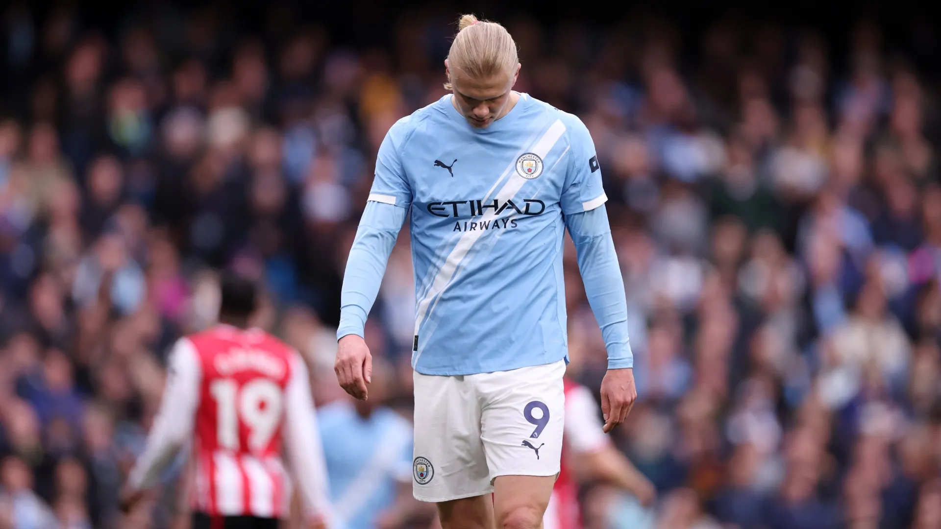 Erling Haaland looks dejected.
