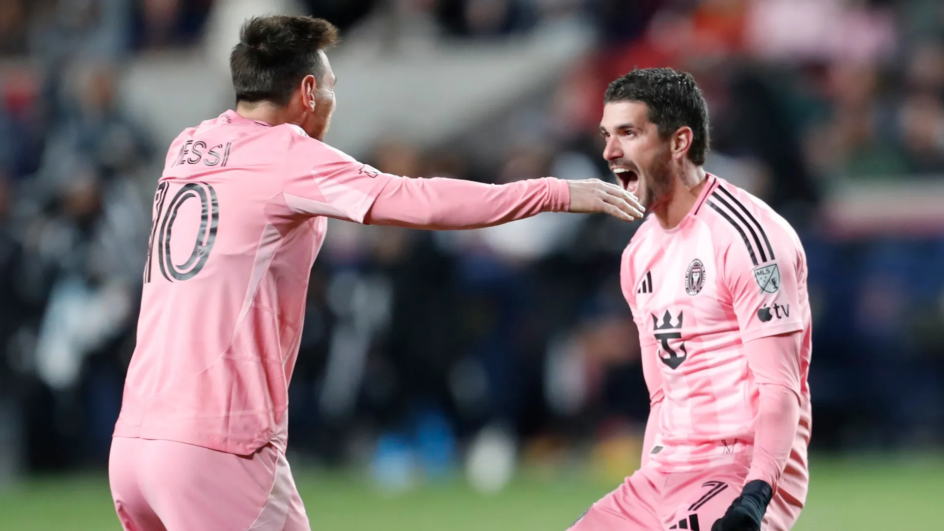 Rodrigo De Paul #7 of Inter Miami CF celebrates with teammate Lionel Messi #10.