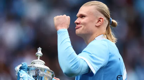 Erling Haaland of Manchester City celebrates with the Emirates FA Cup trophy