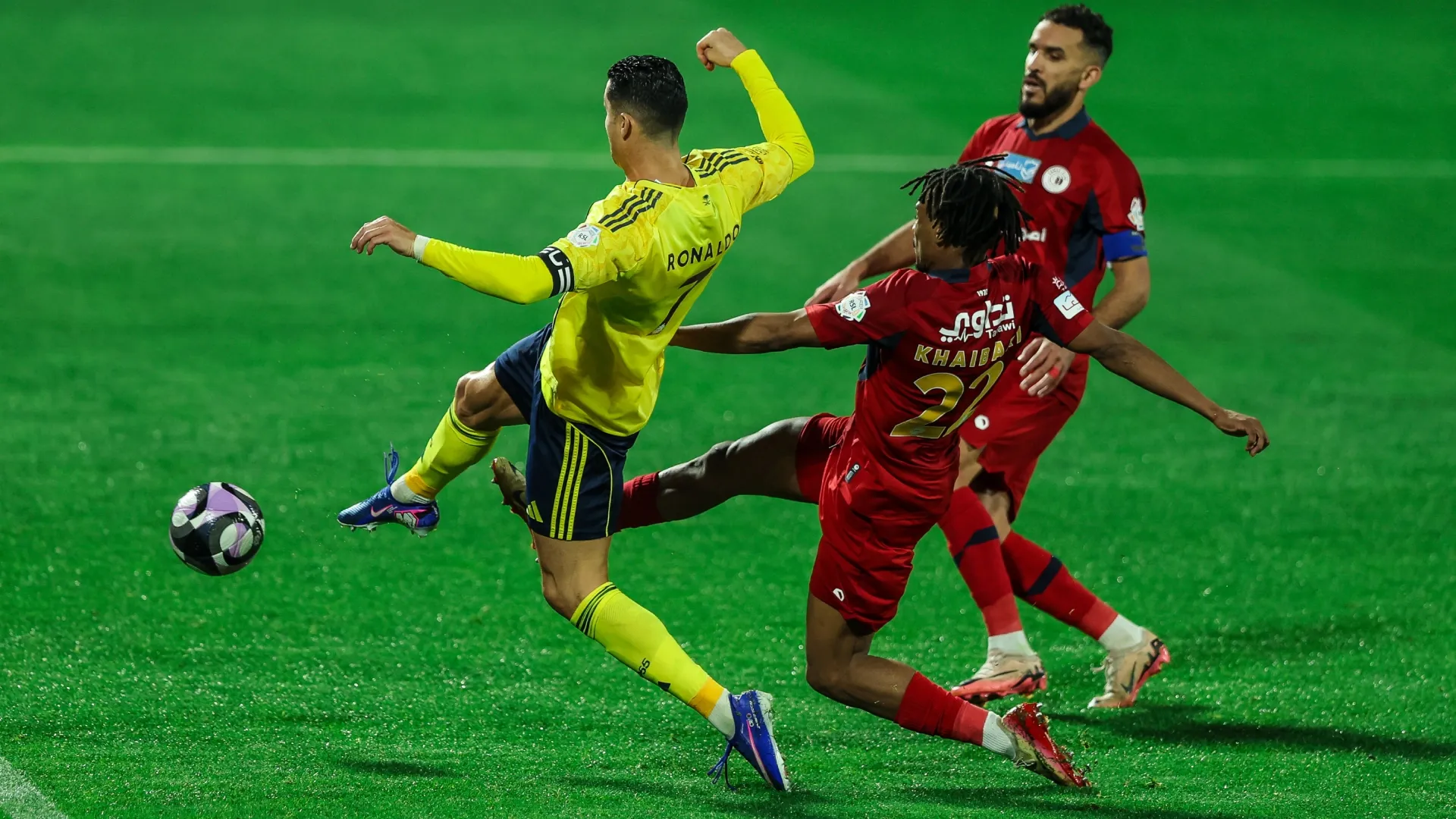 Cristiano Ronaldo of Al Nassr battling for the ball during the Saudi pro league match vs Damac.