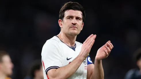 Harry Maguire of England applauds the fans.