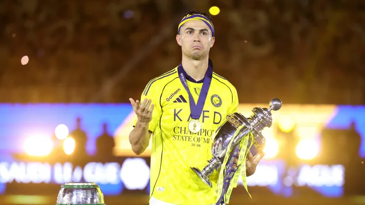 Cristiano Ronaldo of Al Nassr celebrates with the Saudi Pro League Trophy.