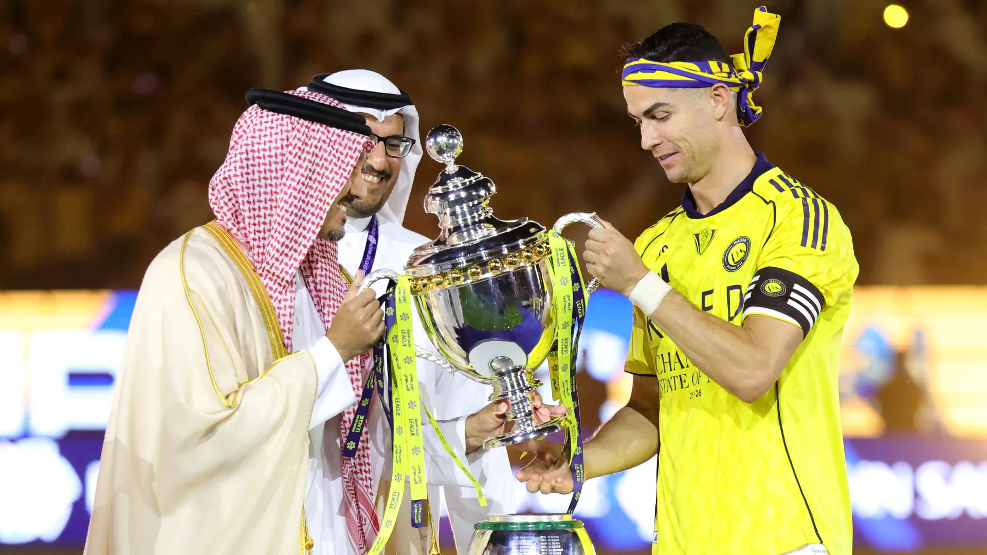 Cristiano Ronaldo of Al Nassr is presented with the Saudi Pro League Trophy. (Getty Images)