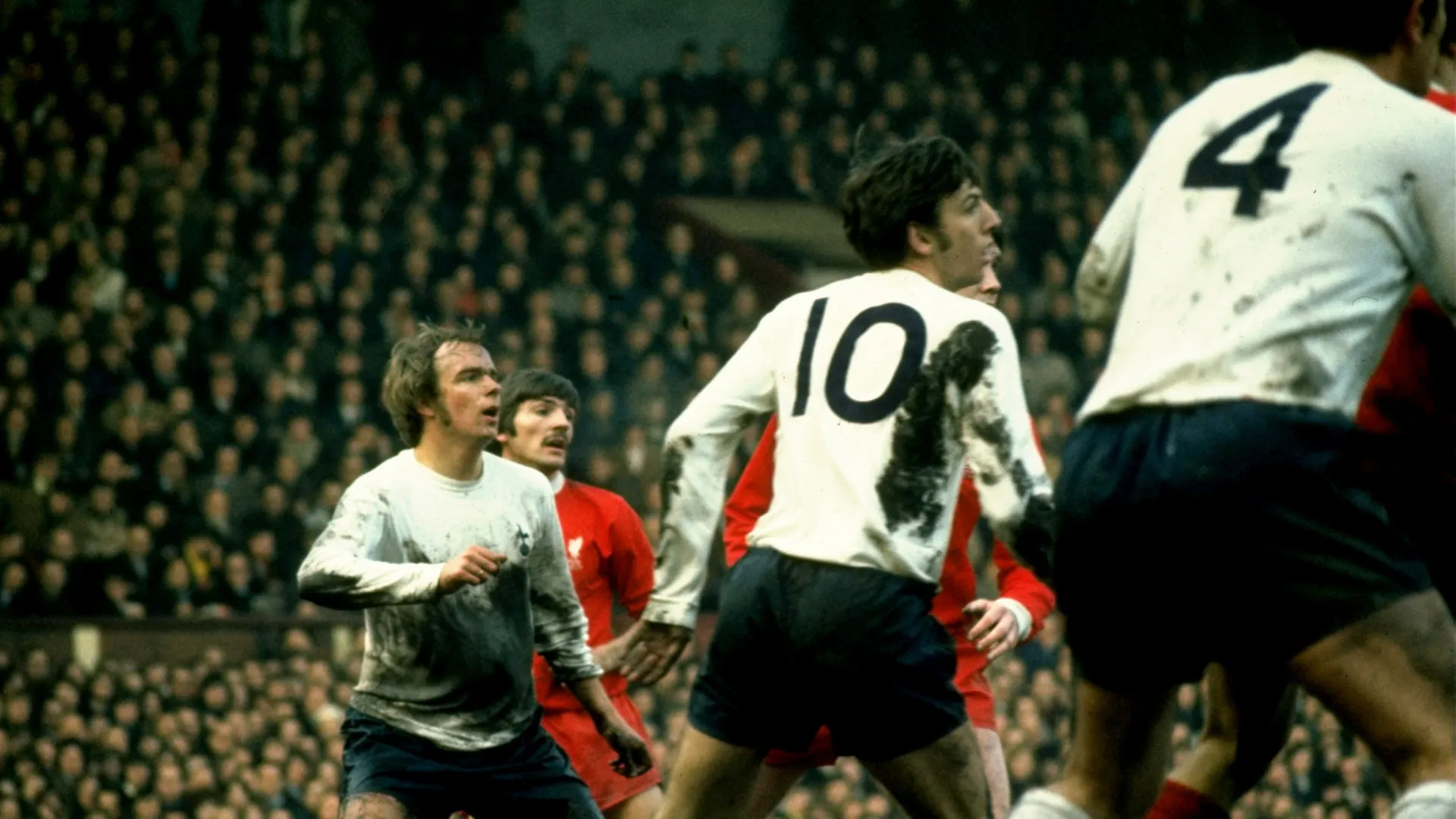 Phillip Beal (left) of Tottenham Hotspur in action during a 1976 Division One match against Liverpool.