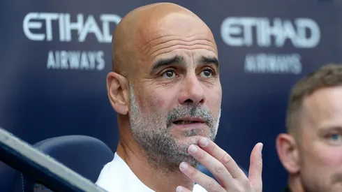 Pep Guardiola, Manager of Manchester City, looks on prior to the Premier League match.