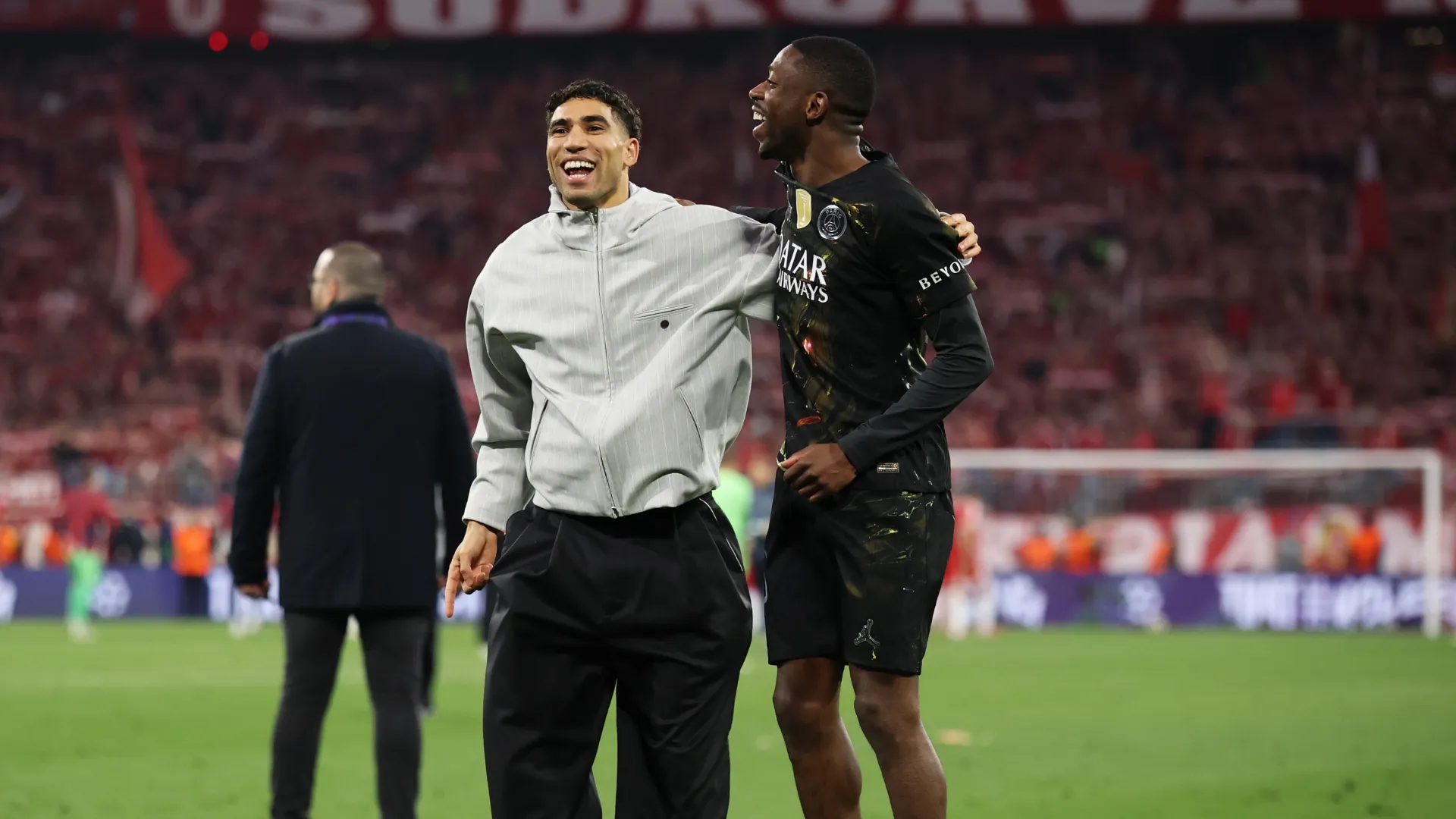 Achraf Hakimi and Ousmane Dembele of Paris Saint-Germain celebrating.