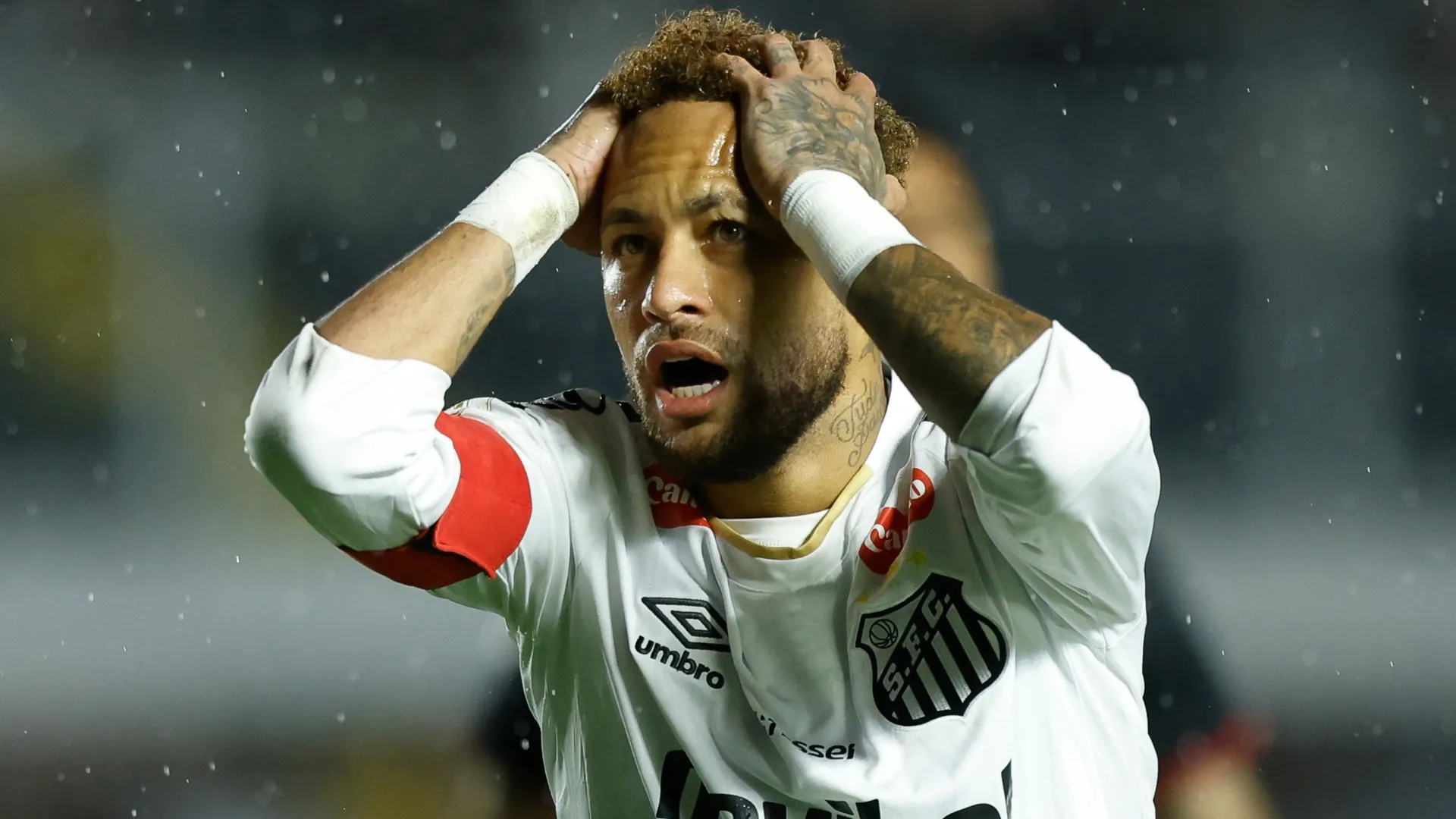 Neymar of Santos reacts during a match.