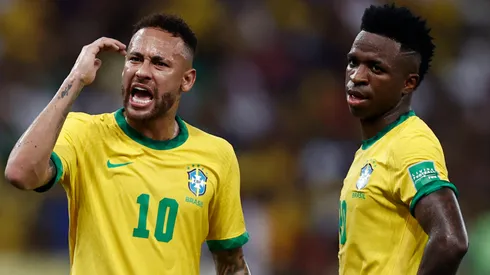Neymar Jr. of Brazil reacts next to teammate Vinícius Júnior of Brazil