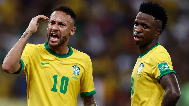 Neymar Jr. of Brazil reacts next to teammate Vinícius Júnior of Brazil