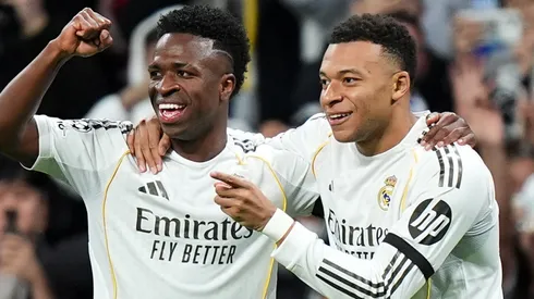 Kylian Mbappe of Real Madrid celebrates with Vinicius Jr.