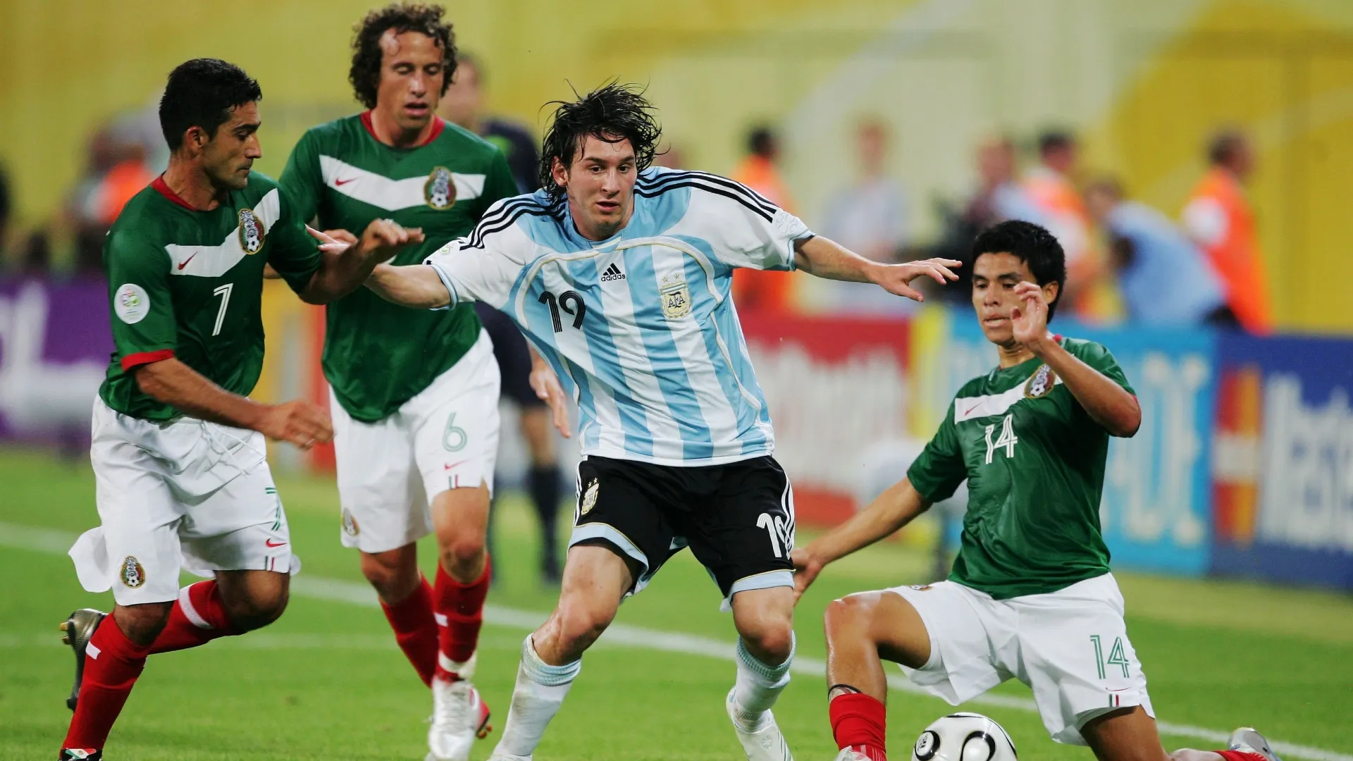 Lionel Messi of Argentina is put under pressure by Zinha, Gerardo Torrado and Gonzalo Pineda of Mexico.