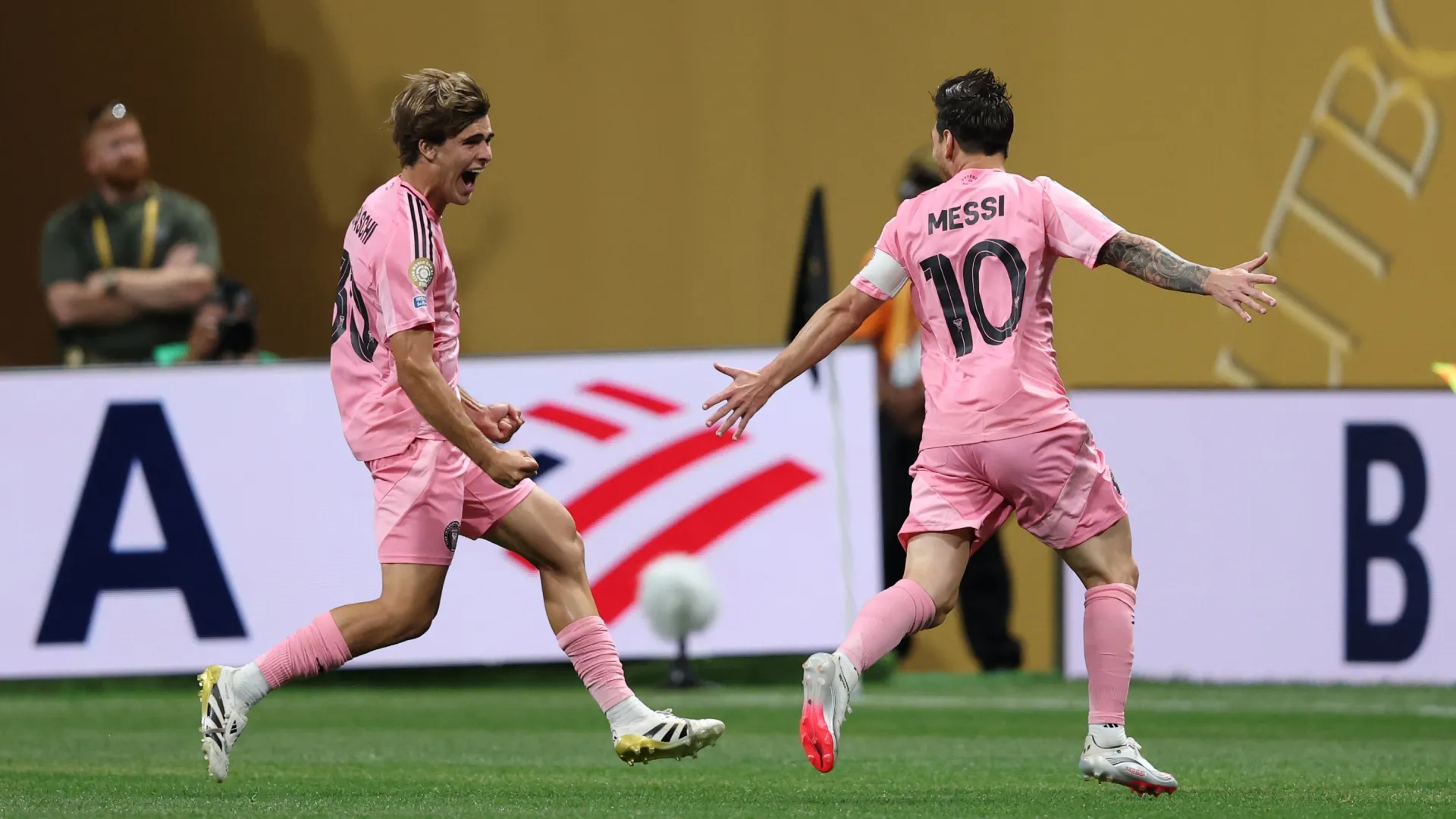Lionel Messi #10 of Inter Miami CF celebrates scoring his team's second goal with teammate Benjamin Cremaschi.