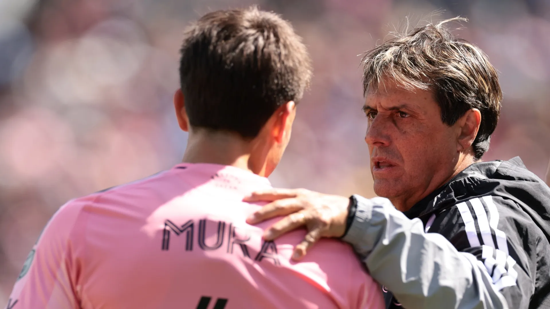 Guillermo Hoyos, Head Coach of Inter Miami, chats with Facundo Mura.