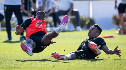 Casemiro tackles Endrick during training.