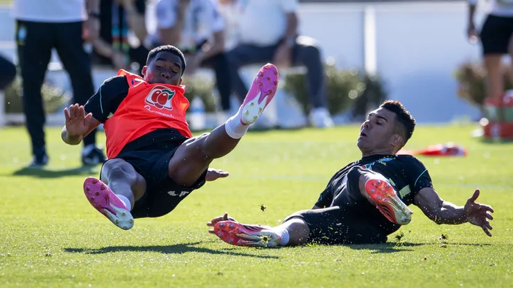 Casemiro tackles Endrick during training.