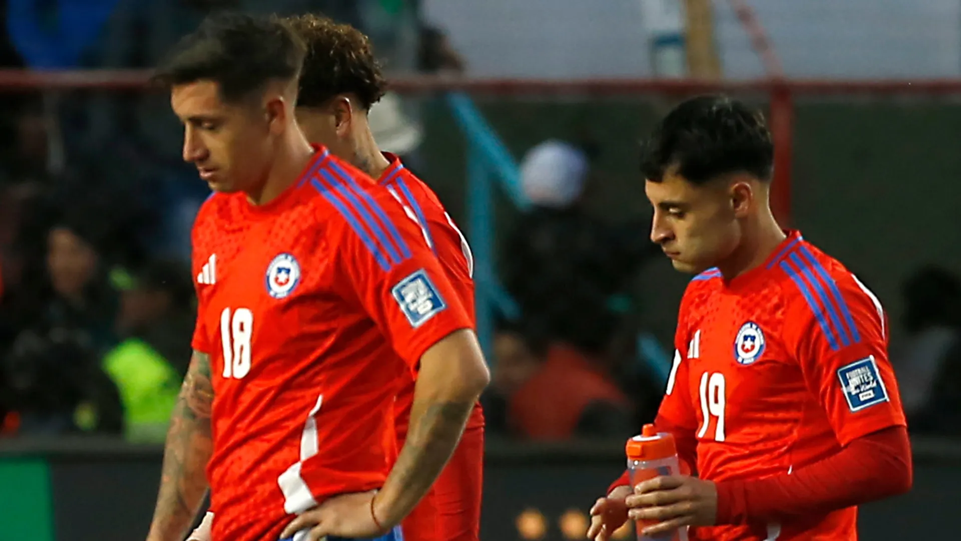 Chile players react after losing in the CONMEBOL 2026 World Cup qualifier game.