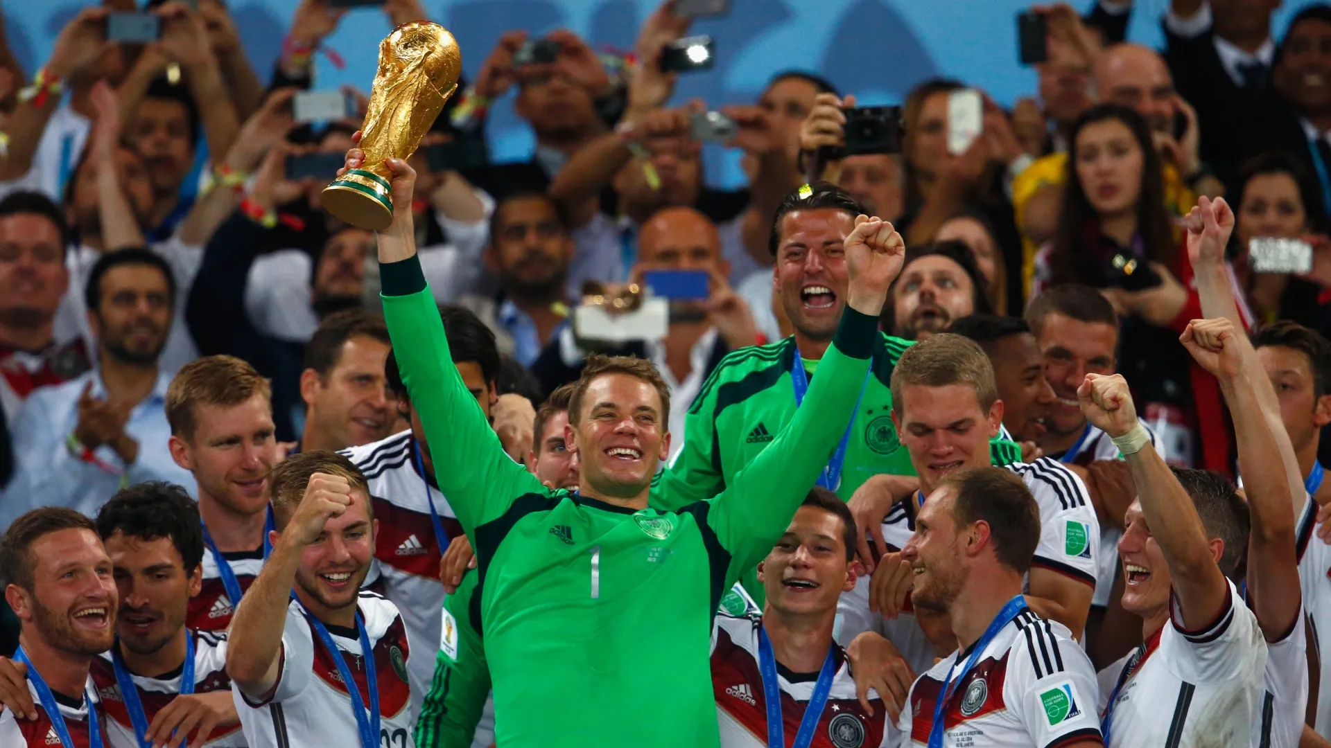 Manuel Neuer of Germany lifts the World Cup trophy.