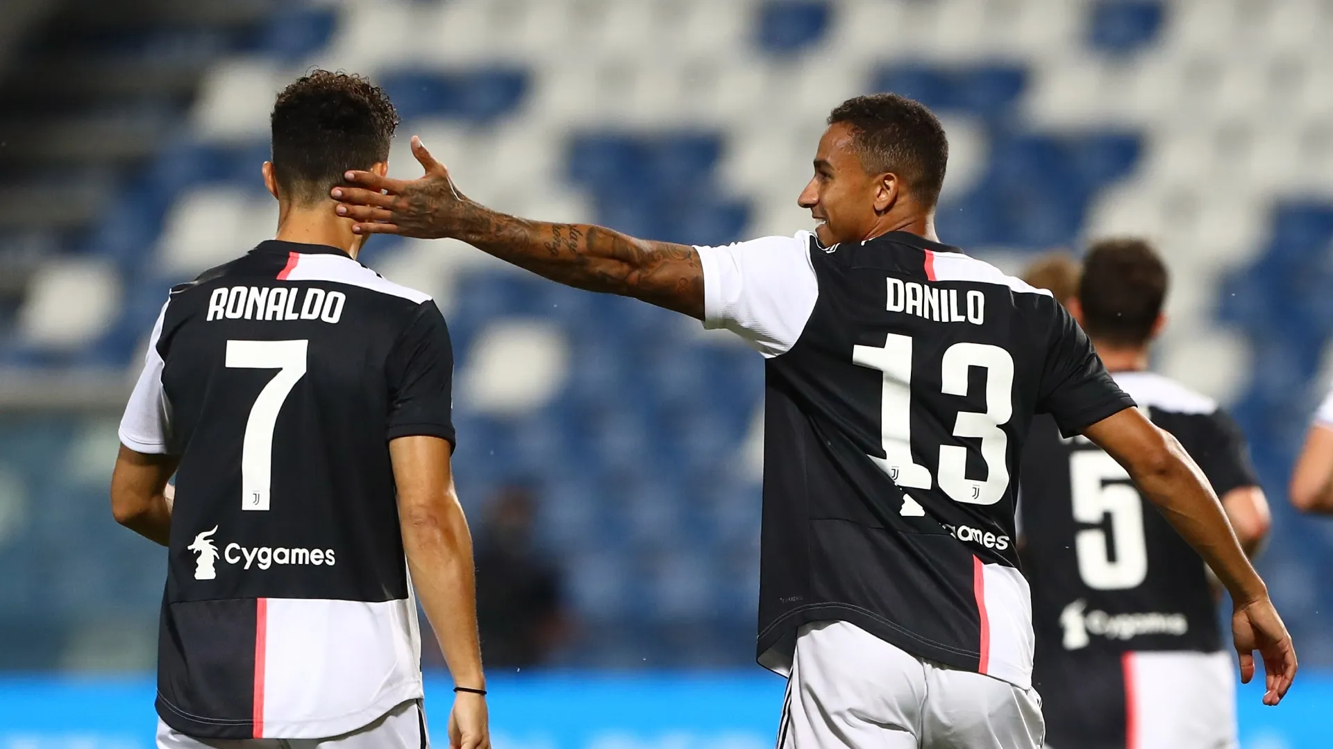 Danilo (R) of Juventus FC celebrates with his team-mate Cristiano Ronaldo (L) after scoring the opening goal.