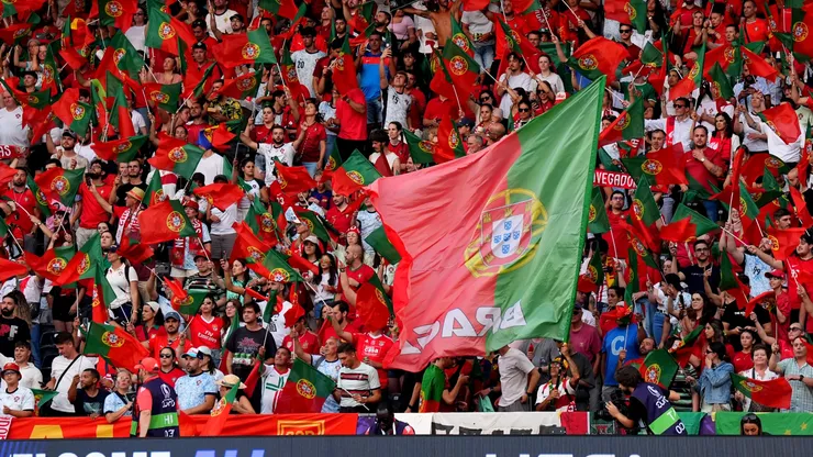 Fans of Portugal wave their national flag