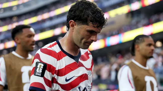 Christian Pulisic #10 of the United States looks on as he walks off at the end of the first half