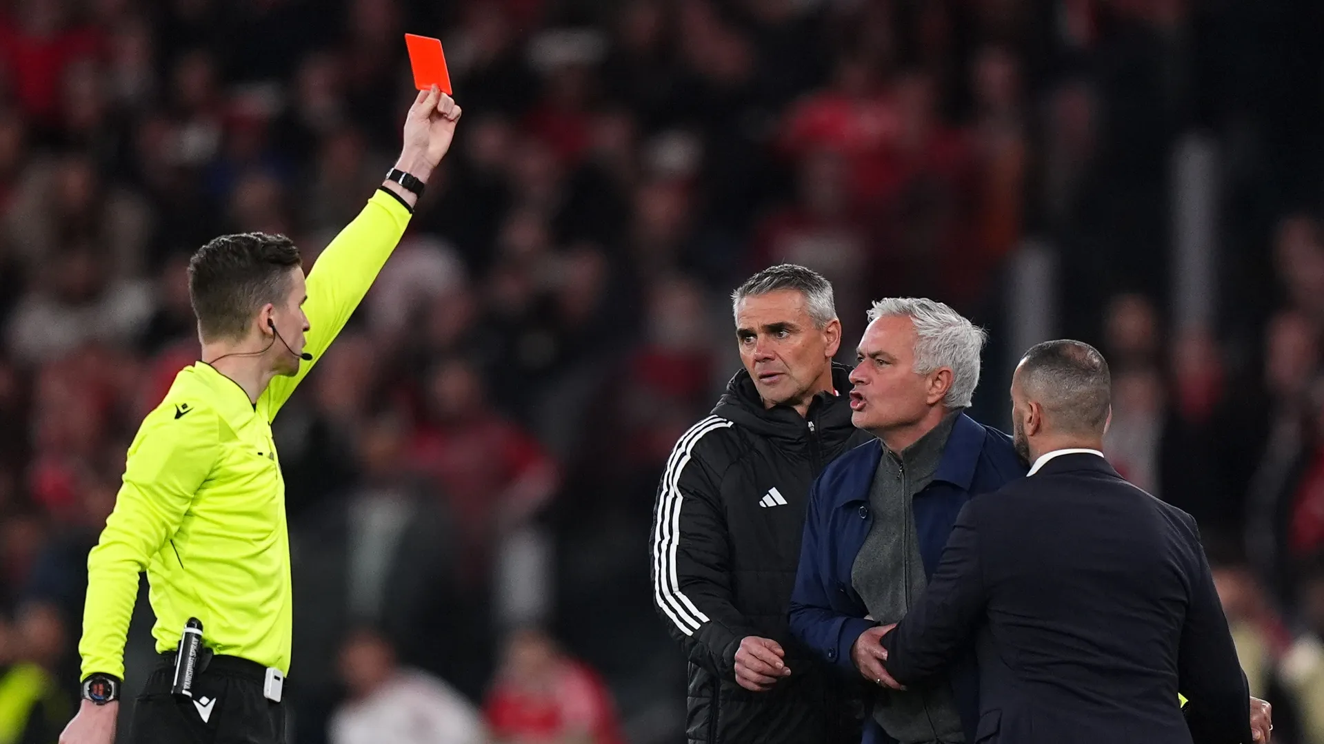 Jose Mourinho, Head Coach of Benfica, is shown a red card by referee Francois Letexier.