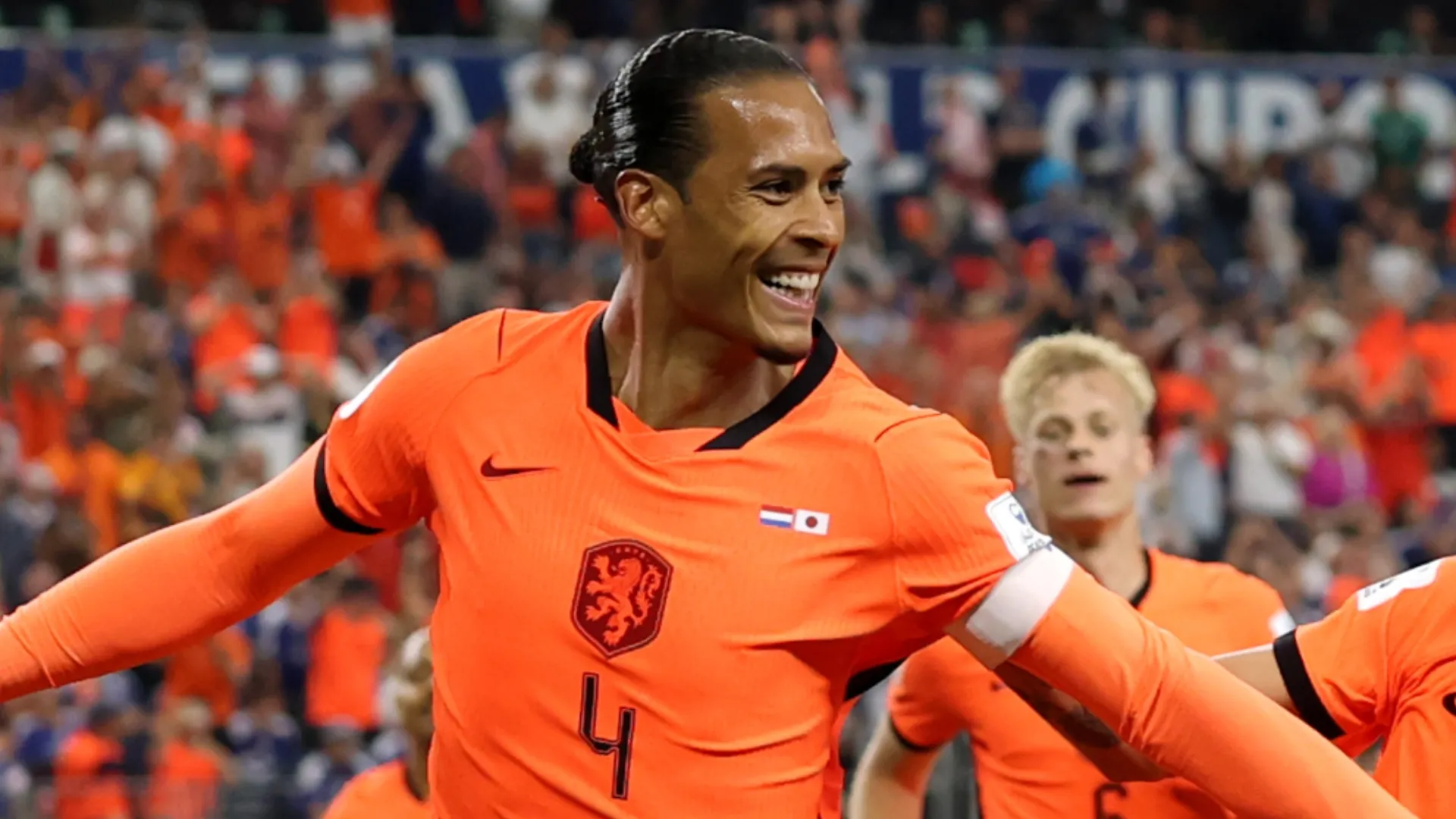 Virgil van Dijk #4 of Netherlands celebrates scoring a goal.