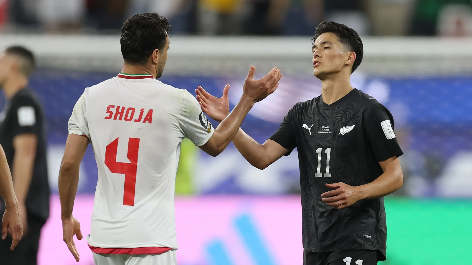 Shoja Khalilzadeh #4 of IR Iran and Elijah Just #11 of New Zealand shakes hands after the 2-2 draw.