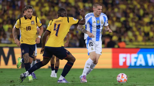 Franco Mastantuono of Argentina is challenged by Joel Ordoñez of Ecuador.