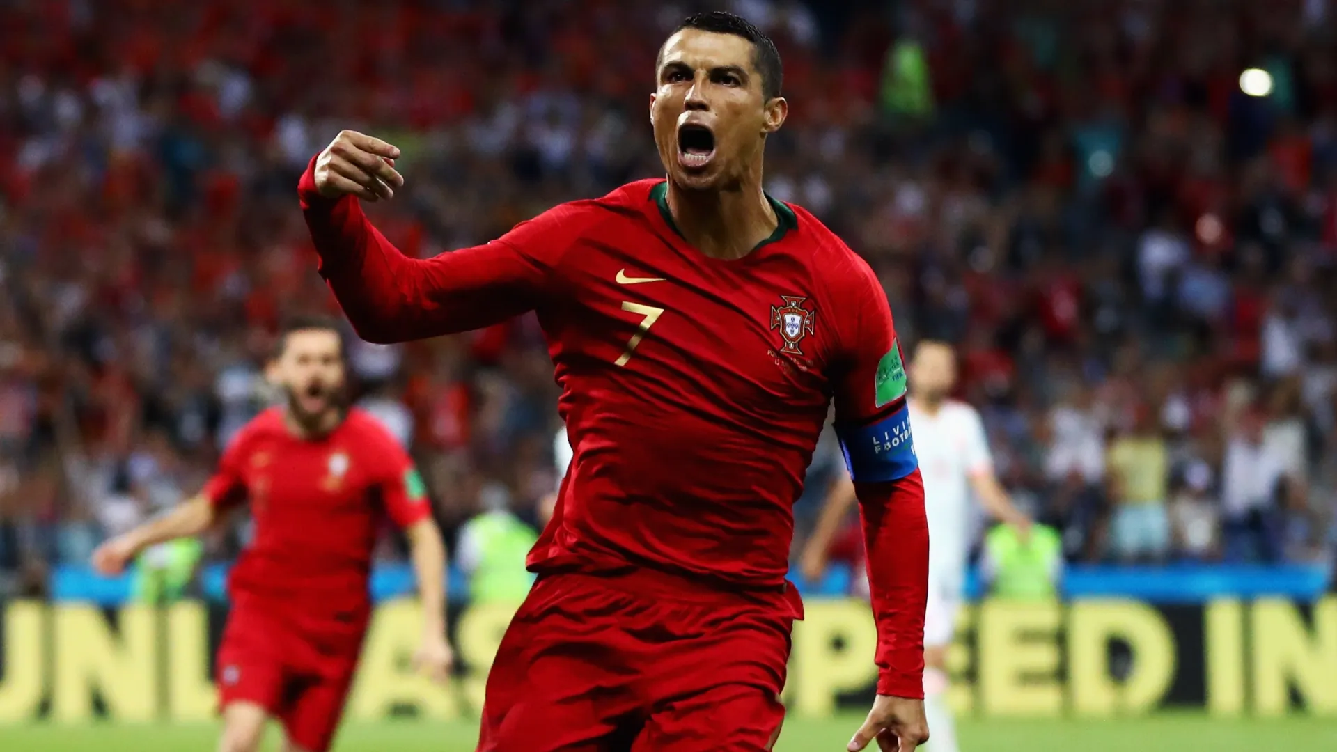 Cristiano Ronaldo of Portugal celebrates after scoring against Spain.