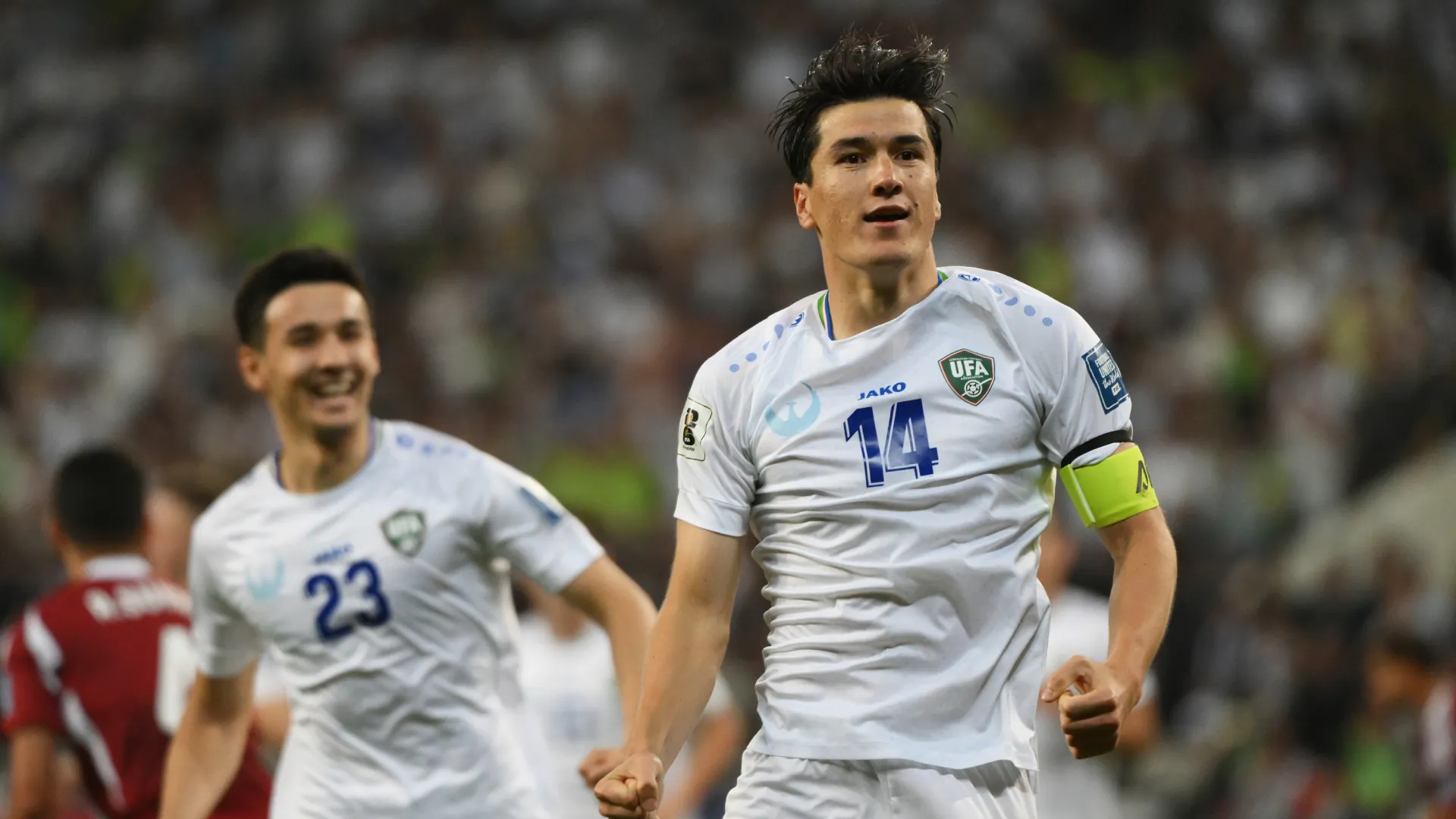 Eldor Shomurodov of Uzbekistan celebrates after scoring. (Getty Images)