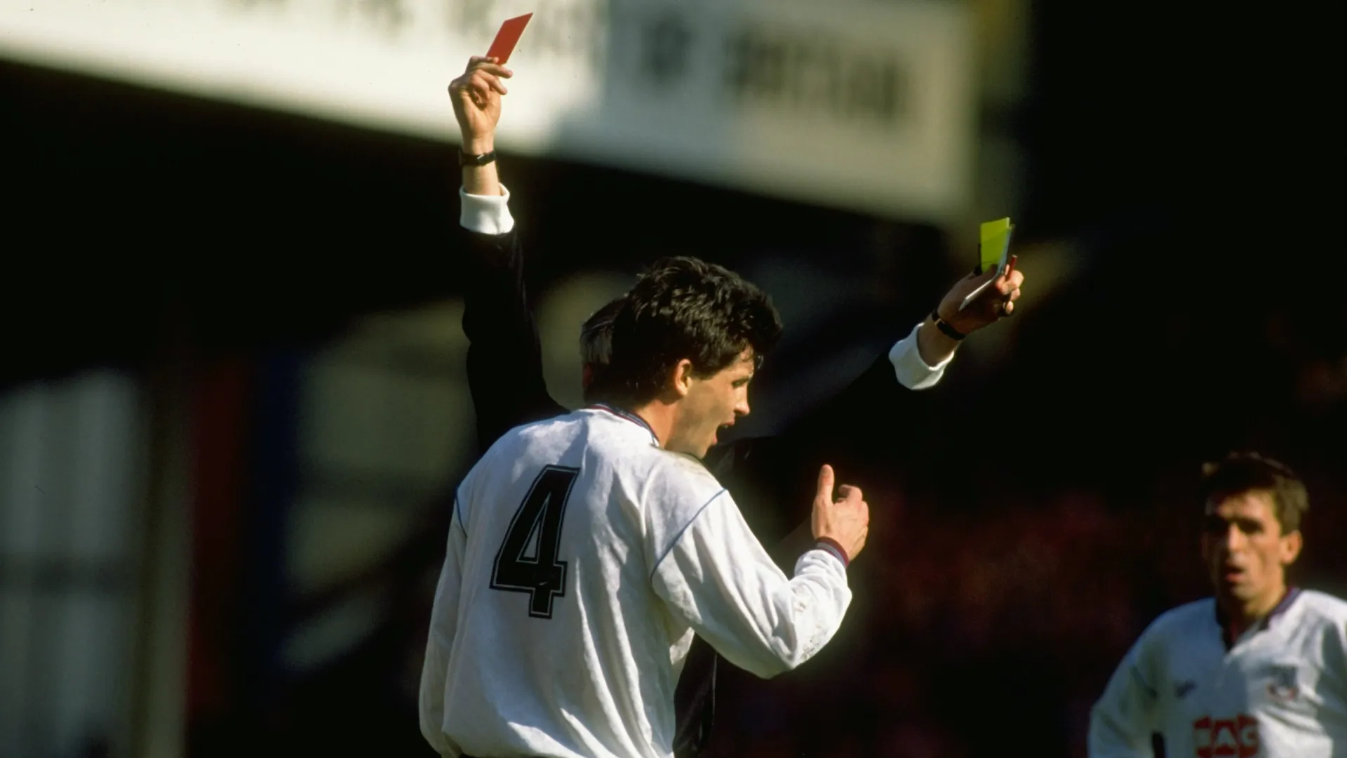 A player is sent off after being shown the red card by the referee