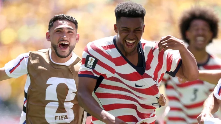 Alex Freeman #16 of the United States celebrates scoring a goal.