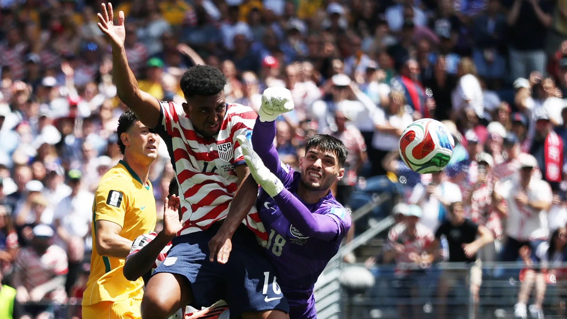 Alex Freeman #16 of the United States heads to score a goal.