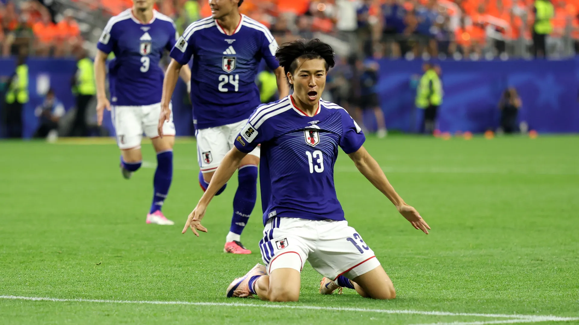 Keito Nakamura #13 of Japan celebrates a goal. (Getty Images)