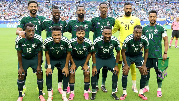 Players of Saudi Arabia pose for a team photograph.