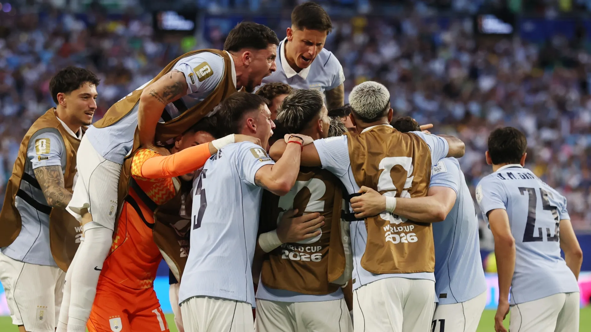 Players of Uruguay celebrate as Maxi Araujo (not pictured) #20 of Uruguay scores a goal.