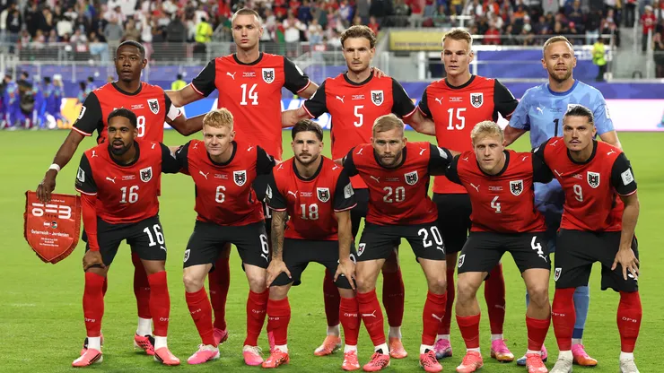 Players of Austria pose for a team group photograph.