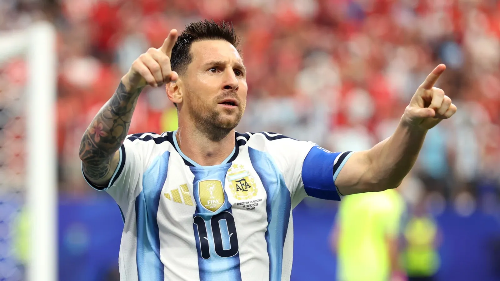 Lionel Messi of Argentina celebrates after scoring against Austria.