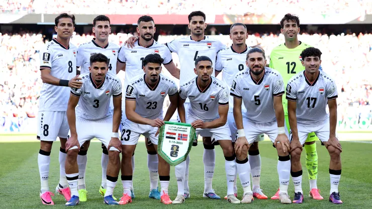 Iraq players pose for a team photograph.