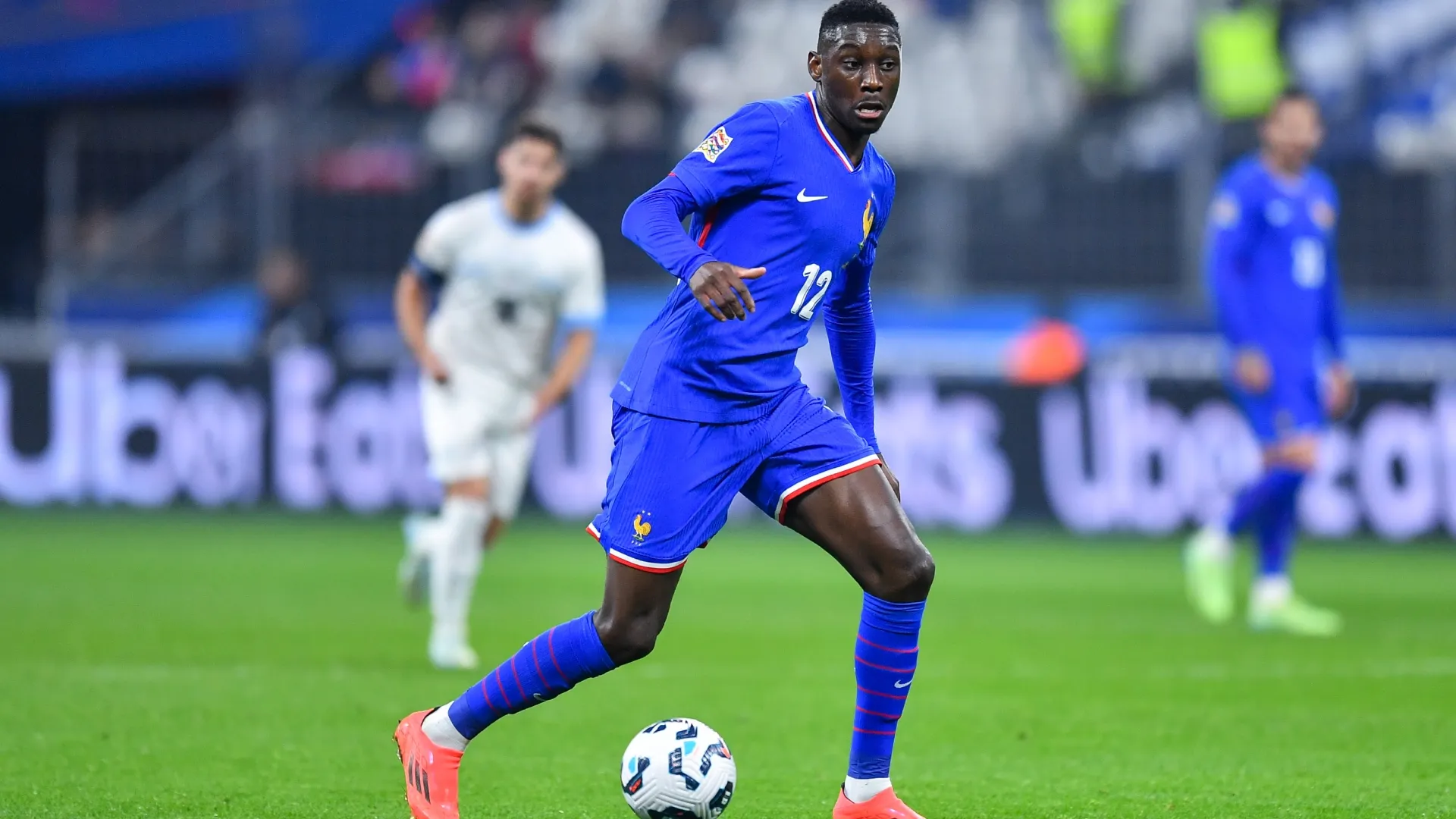 Randal Kolo Muani of France runs with the ball.