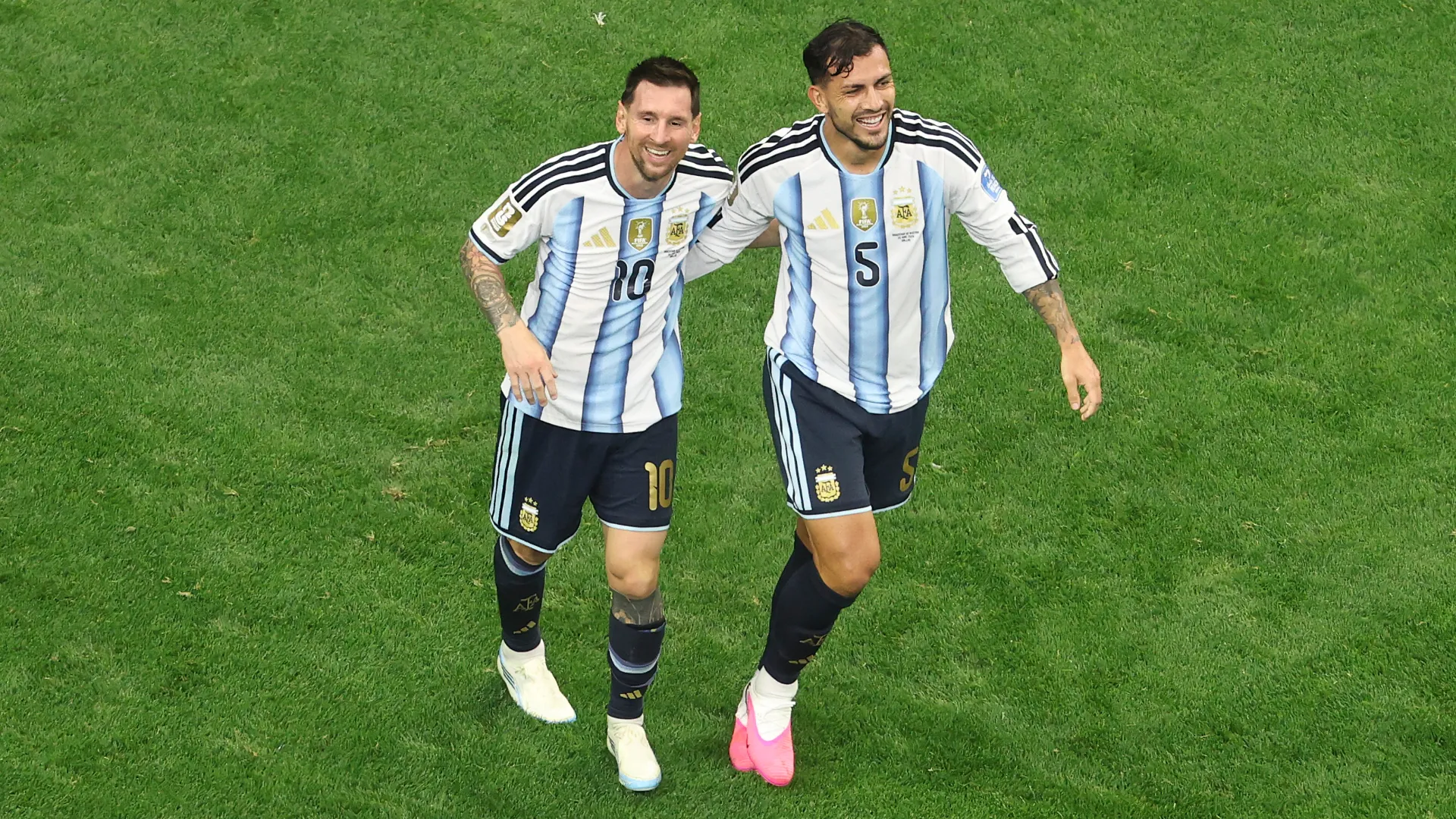 Lionel Messi celebrates a goal with Leandro Paredes. (Getty Images)